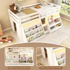 A white loft bed with integrated bookshelves and LED lighting, shown in a child's room setting with toys and decorative items. Voir les images du produit