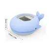 A blue whale-shaped digital thermometer. Produktbild-Vorschau