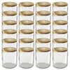 A grid of empty glass jars with gold lids. Voir les images du produit