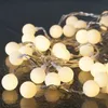 A close-up shot of a string of warm white LED lights. Náhled obrázku produktu