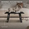 A black coffee table with decorative items on it, placed on a textured rug in a living room setting. Náhľad obrázku produktu
