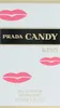 The image shows the front of a perfume box for Prada Candy Kiss. Náhled obrázku produktu
