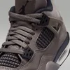 A close-up view of the Nike Air Jordan 4 Retro OG "Cave Stone" sneakers. Produktbild-Vorschau