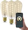 Three smart LED bulbs are displayed next to a smartphone showing a lighting control app. Produktbild-Vorschau
