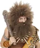 A man dressed as a caveman, holding a club and wearing a costume with a large wig, beard, and bone necklace. Produktbild-Vorschau