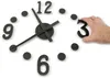 A hand is placing the number '3' onto a wall clock. Náhled obrázku produktu