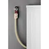 A close-up shot of a washing machine water supply hose with an Aquastop safety device attached to the wall connection. Voir les images du produit