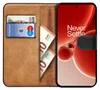 A book-style phone case is open, showing a phone screen with the 'Never Settle' slogan, a credit card, and euro banknotes. Náhľad obrázku produktu