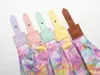 A close-up view of five colorful straps with tie-dye fabric. Produktbild-Vorschau