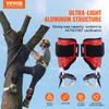 A person is climbing a tree using climbing spikes. Anteprima dell’immagine prodotto