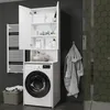 A bathroom scene featuring a washing machine and a tall cabinet above it, with a towel rack and a bathrobe on the wall. Produktbild-Vorschau