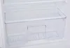 Close-up view of an empty transparent crisper drawer inside a refrigerator. Produktbild-Vorschau