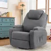 A gray fabric recliner chair is shown in a living room setting, with a blue dresser and a lamp in the background. Náhled obrázku produktu