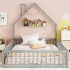 A child's bed in a bedroom with pink walls and yellow and white mountain-themed decor. Voir les images du produit