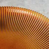 A close-up of a fluted dessert plate. Produktbild-Vorschau