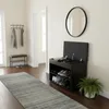 An entryway with a shoe cabinet, bench, coat rack, and rug. Náhľad obrázku produktu