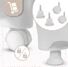 Close-up view of a white baby high chair's wheel and a set of replacement wheels. Voir les images du produit