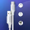 A close-up view of a white USB-A to USB-C charging cable with silver connectors, set against a gradient blue and white background. Inset circles highlight the cable's flexibility and internal construction. Produktbild-Vorschau