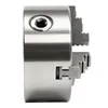 A close-up, side view of a metal lathe chuck with three jaws, presented on a white background. Náhled obrázku produktu