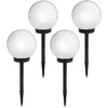 Four white globe-shaped garden lights on black stakes against a white background. Voir les images du produit