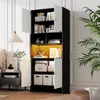 A tall, multi-compartment cabinet with doors, some open, displaying various items like books, vases, and decorative objects. The cabinet is in a room setting with a bedside table and a plant visible. Produktbild-Vorschau