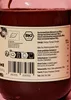 A close-up of a jar of spread, showing the label with nutritional information and certifications. Produktbild-Vorschau