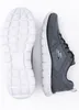 A pair of Skechers shoes, one sole-up and the other side-view, on a white background. Produktbild-Vorschau