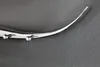 A close-up, angled shot of a silver wall hook against a textured gray background. The hook is shaped like a stylized bull's head with horns. Produktbild-Vorschau