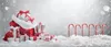 Christmas gifts and candy canes in the snow. Voir les images du produit