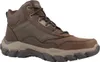 A single brown Skechers boot is shown from the side against a white background. Voir les images du produit