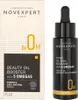 A product shot of a beauty oil bottle and its packaging. Podgląd zdjęcia produktu