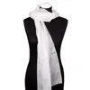 A white silk scarf draped over a black mannequin. Produktbild-Vorschau