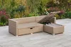 An outdoor lounge set with storage, placed on a patio with plants in the background. Produktbild-Vorschau