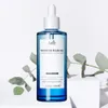 A bottle of La'dor Wonder Hair Oil is displayed on a white pedestal, with green leaves in the background. Anteprima dell’immagine prodotto