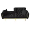 A black velvet sofa with gold legs and decorative studs on a white background. Anteprima dell’immagine prodotto