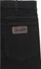 A close-up view of the back pocket of black jeans with a Wrangler logo patch. Produktbild-Vorschau