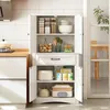 A kitchen cabinet filled with kitchenware and food items. Voir les images du produit