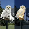 A split image showing a solar-powered owl garden light during the day and at night. Náhled obrázku produktu