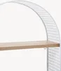 A close-up view of a shelf on a white arched shelf unit. Produktbild-Vorschau