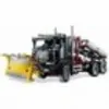 A toy truck with a snow plow attachment. Produktbild-Vorschau