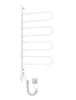 A white electric towel dryer with four foldable arms is shown against a white background. A coiled power cord and plug are visible at the bottom. Náhľad obrázku produktu