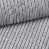 A close-up view of grey corduroy fabric. Produktbild-Vorschau