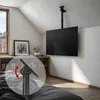 A TV mounted on a ceiling bracket in a bedroom, with a close-up inset showing the bracket's articulation. Anteprima dell’immagine prodotto