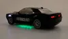 A black remote-controlled car with racing decals and illuminated lights. Náhled obrázku produktu