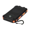 A black and orange solar power bank with a compass on a white background. Voir les images du produit