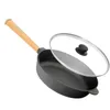 A cast iron frying pan with a wooden handle and a glass lid, shown on a white background. Produktbild-Vorschau