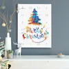 A Christmas advent calendar with a watercolor tree and text is displayed on a shelf. Produktbild-Vorschau