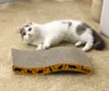 A cat is lying on a carpet next to a scratching board. Produktbild-Vorschau