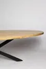 A close-up of an oval wooden dining table with a black metal base. Voir les images du produit