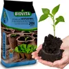 A bag of soil for sowing with coconut fiber and a young plant being held in hands. Produktbild-Vorschau